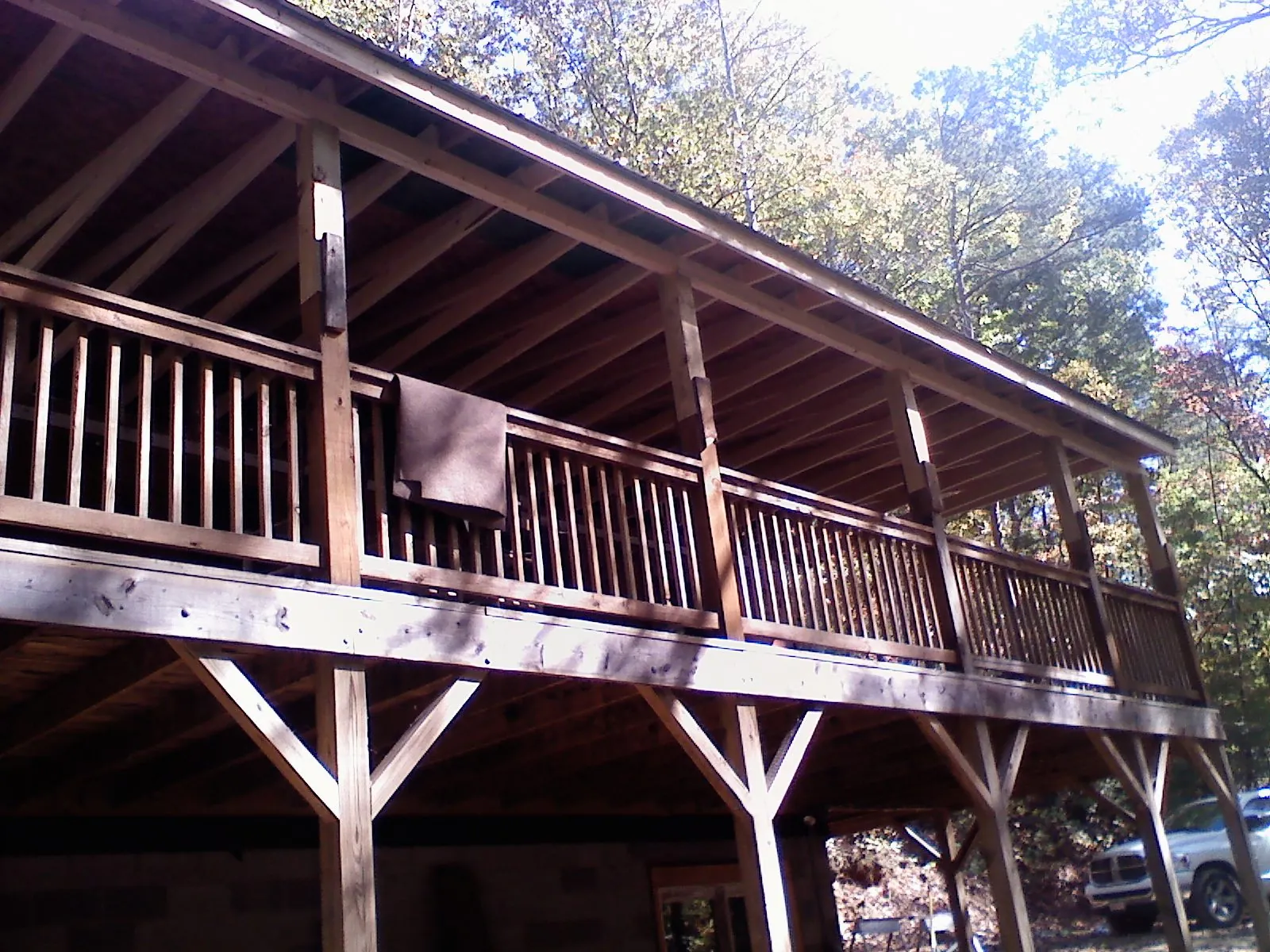 Timber framing under a new elevated porch and deck — Roof Leak Repair in Emery by Roofing Brothers